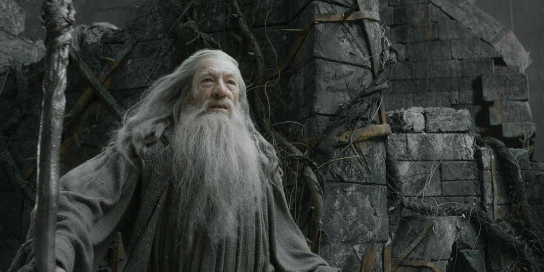 Gandalf with his staff in the ruin of Dol Guldur in The Hobbit