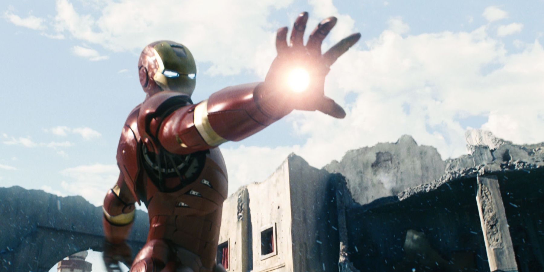 Iron Man with his hand outstretched, about to fire from his suit in Iron Man 1
