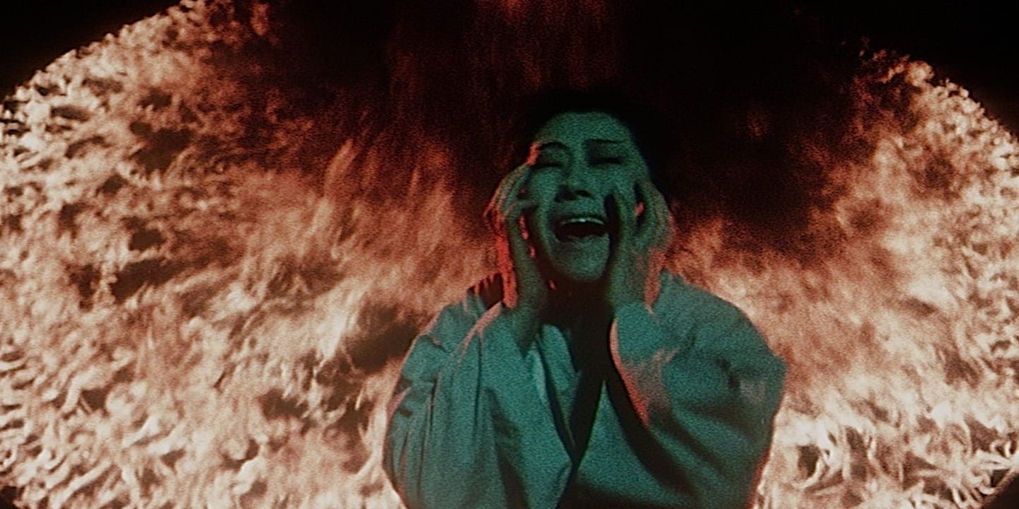 A woman burns in hell in Jigoku.