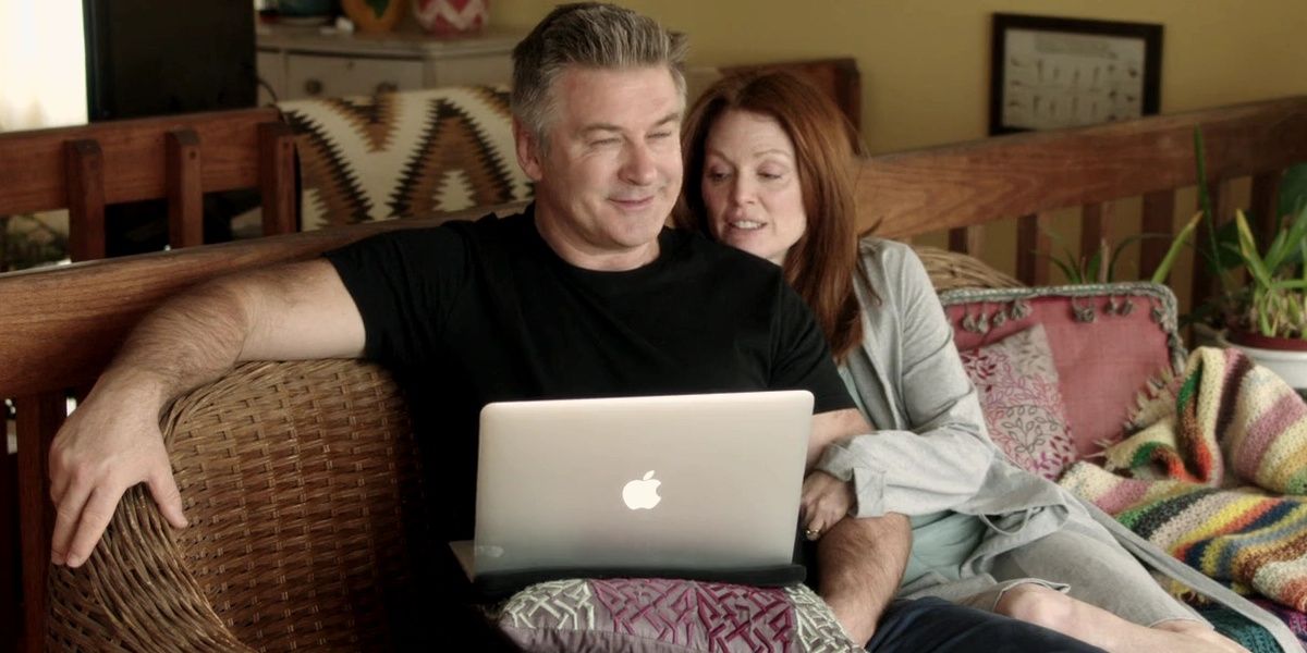 Alice and John sitting on a couch in Still Alice