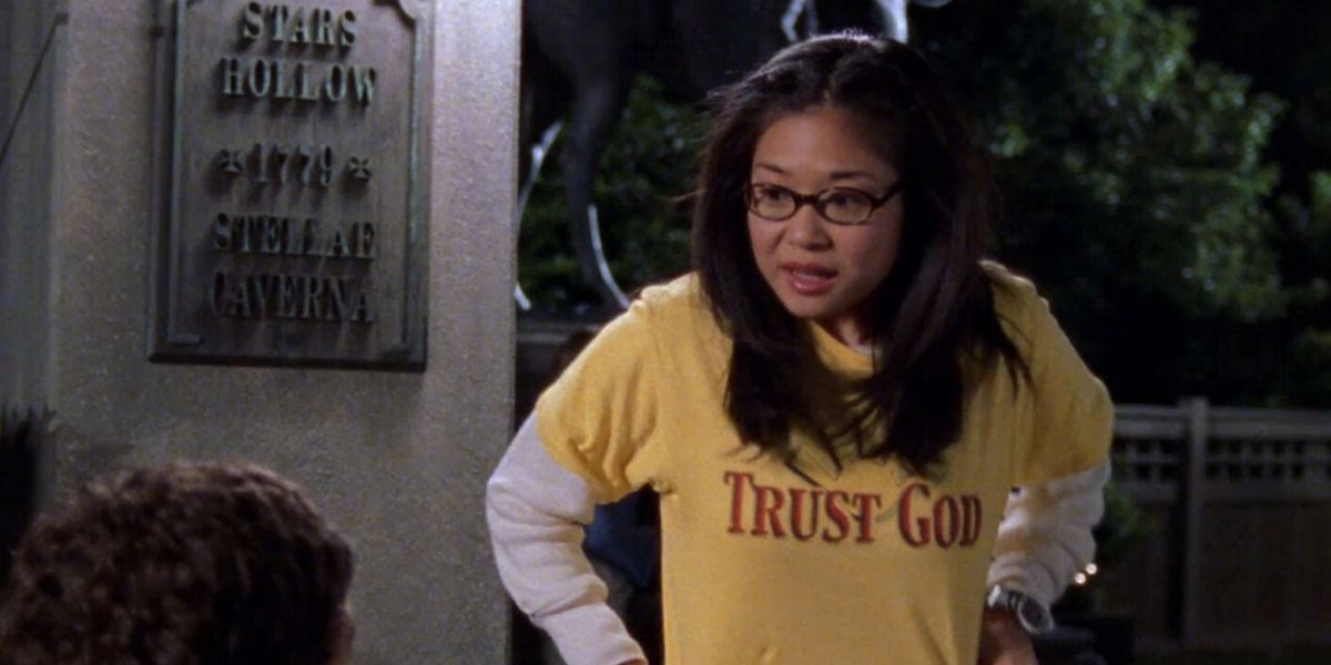 Lane changing out of her t-shirt on Gilmore Girls