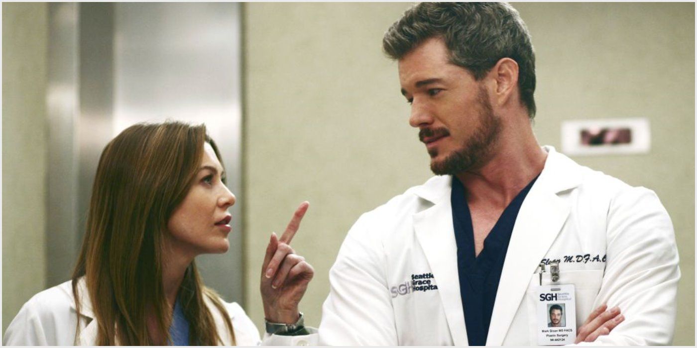 Meredith pointing a finger at Mark in elevator