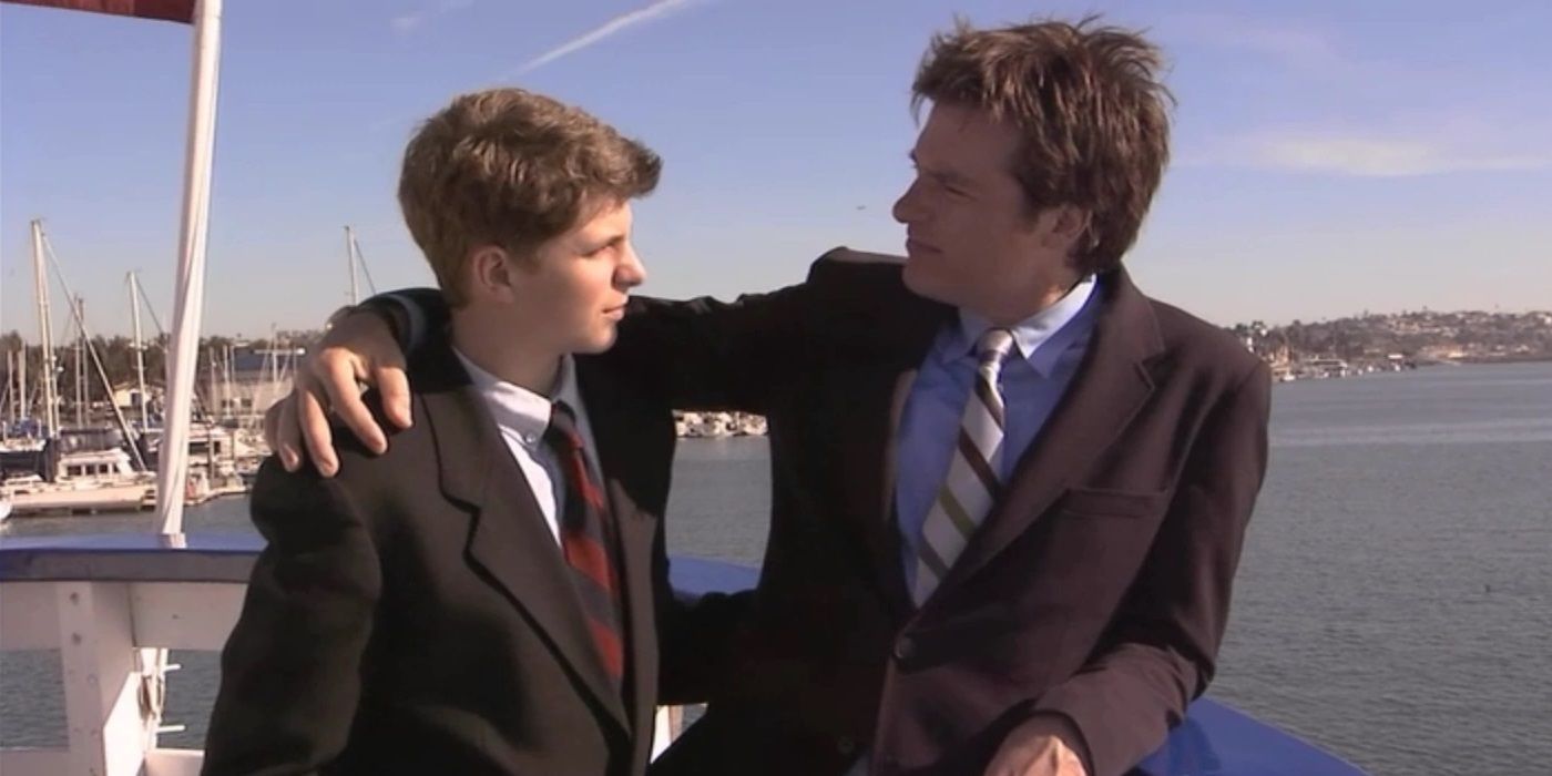 Michael and George Michael standing on a boat in Arrested Development.