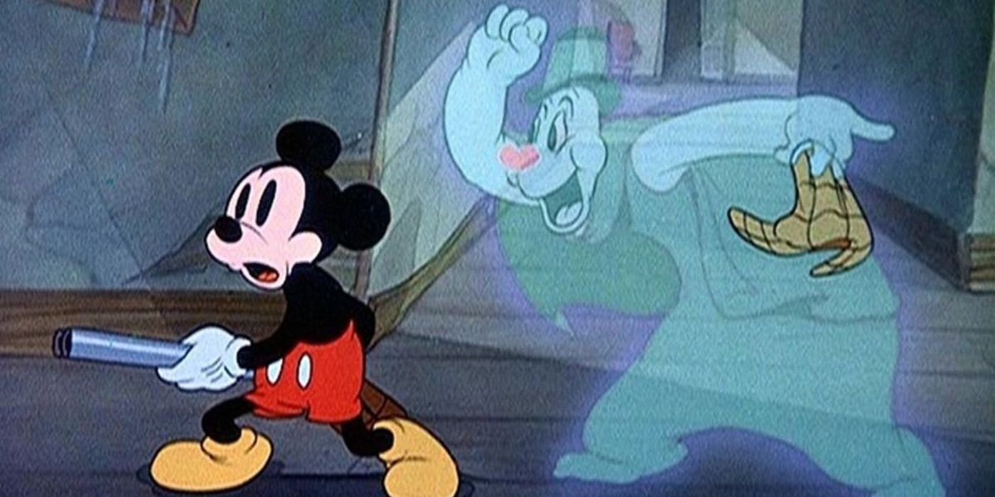 Mickey trying to fight off the ghosts in Lonesome Ghosts