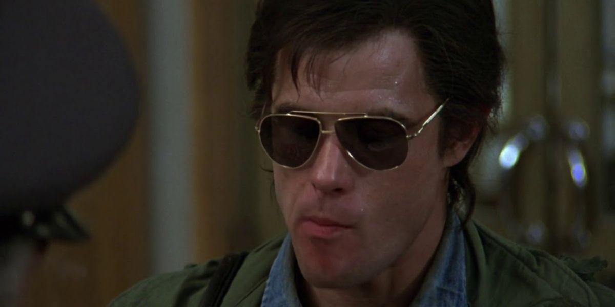Bill Hayes wears sunglasses in Midnight Express