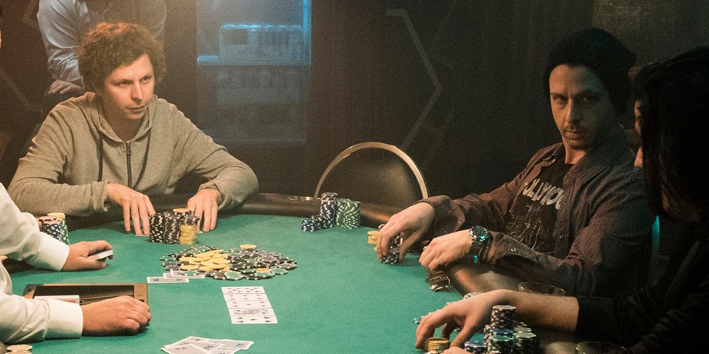 Player X sits at a poker table with two other players from Molly's Game