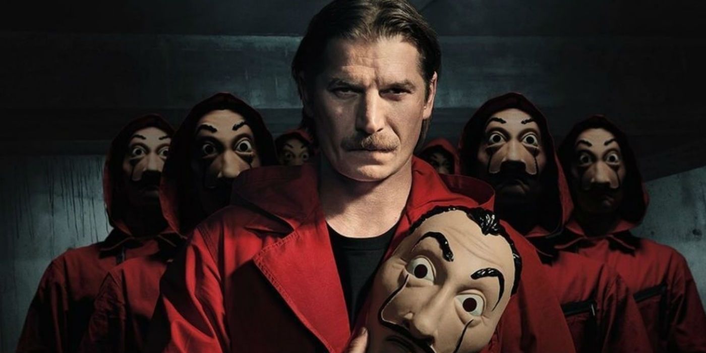 An image of Marseille holding a mask in Money Heist