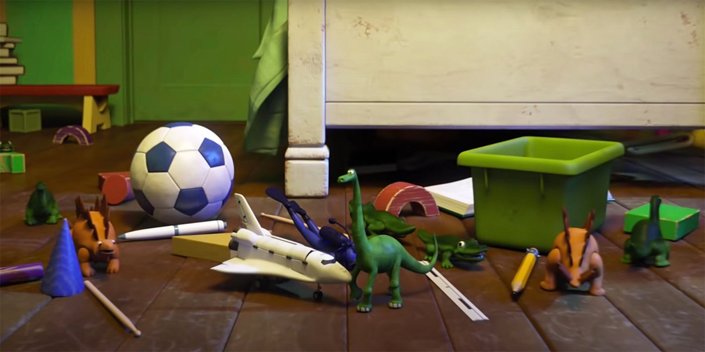 The Good Dinosaur among the toys on the floor in Monsters University.
