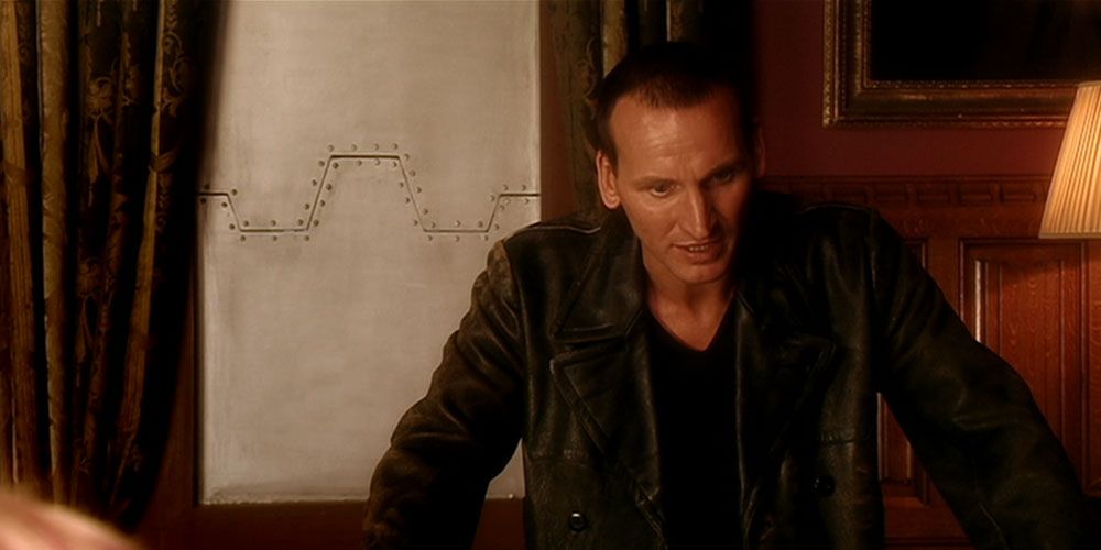 The Ninth Doctor looking stressed in Doctor Who