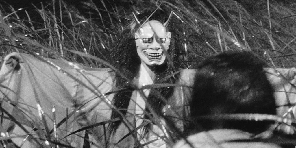 A woman wearing a creepy samurai mask in Onibaba