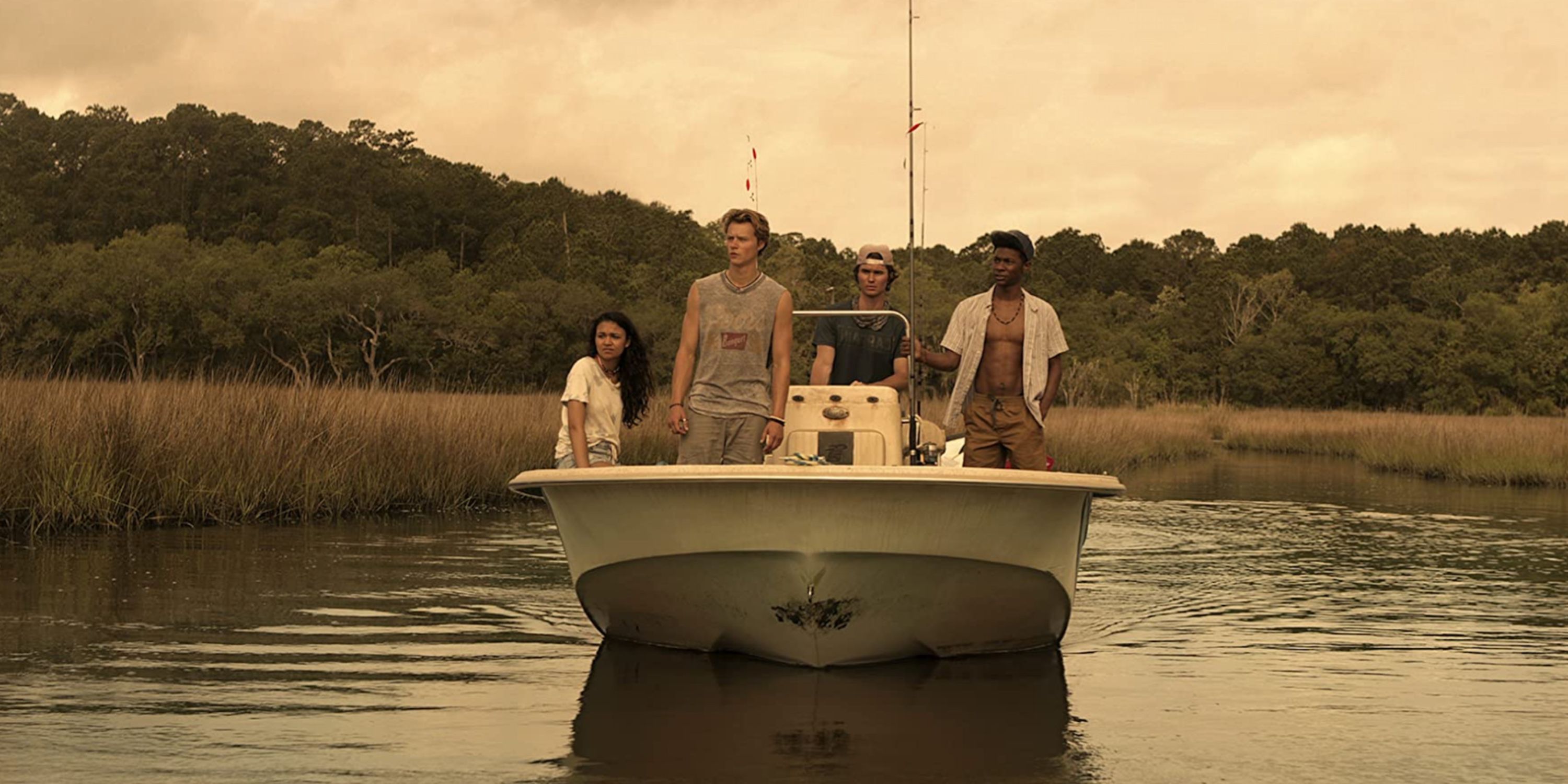 Jonathan Daviss, Rudy Pankow, Chase Stokes, and Madison Bailey in Outer Banks Season 1 on Netflix