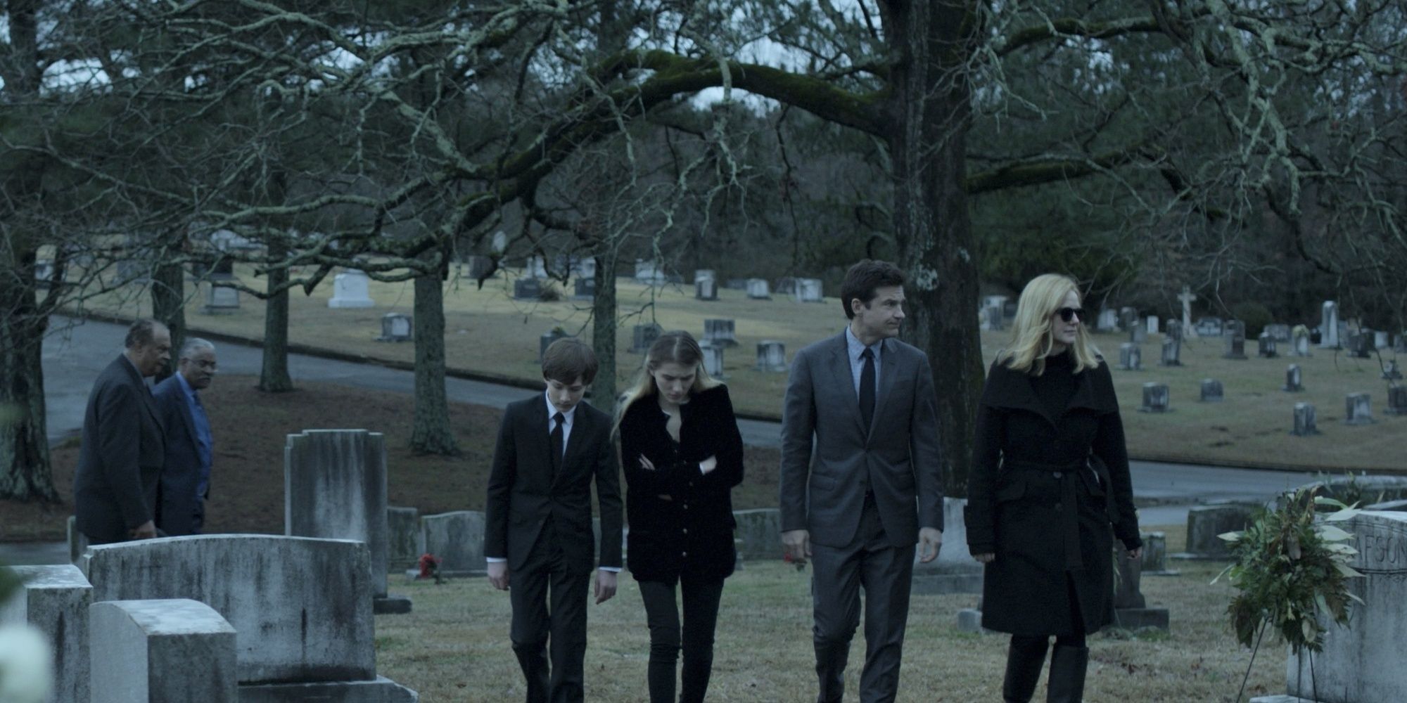 The Byrdes at a funeral
