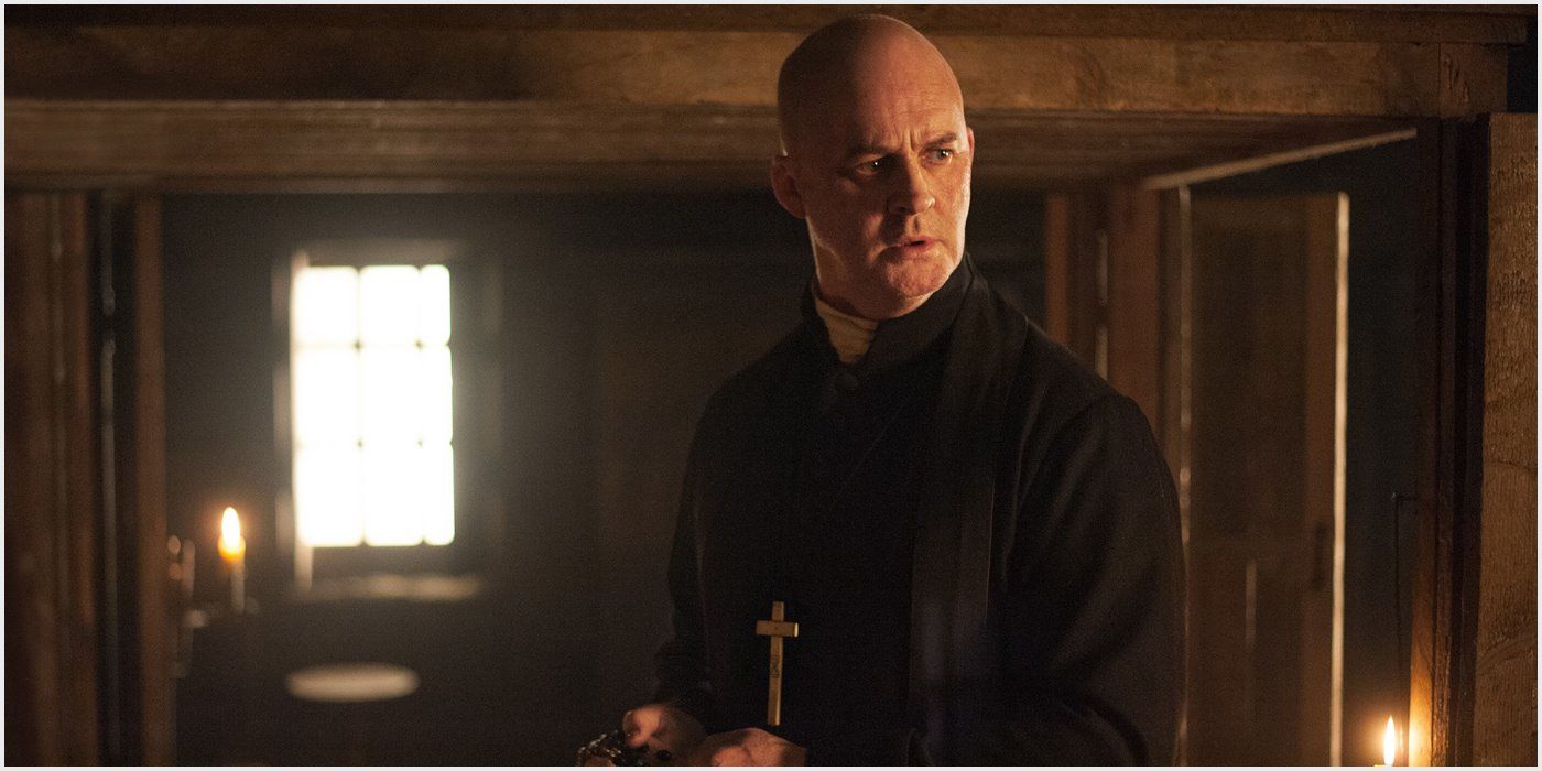 Father Bain looks shocked in Outlander 