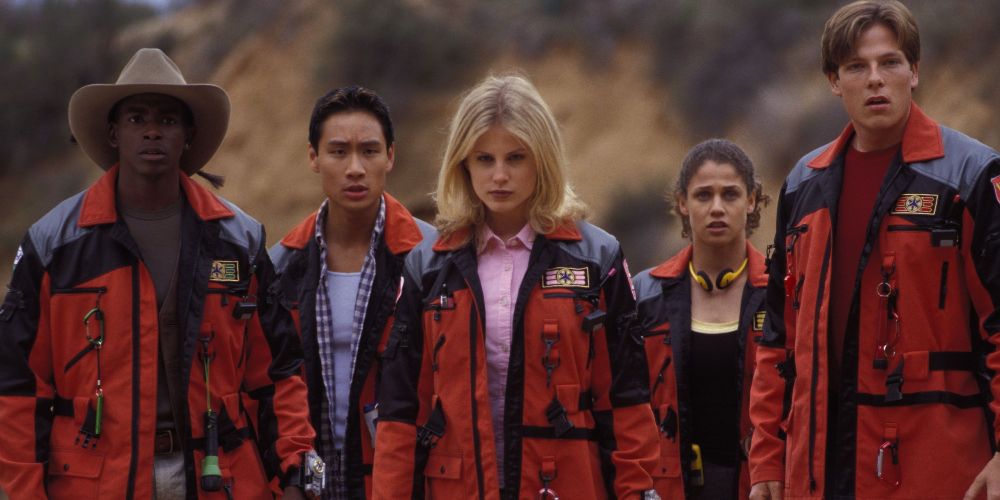 The Power Rangers Lightspeed Rescue team in their civilian clothing and orange jackets