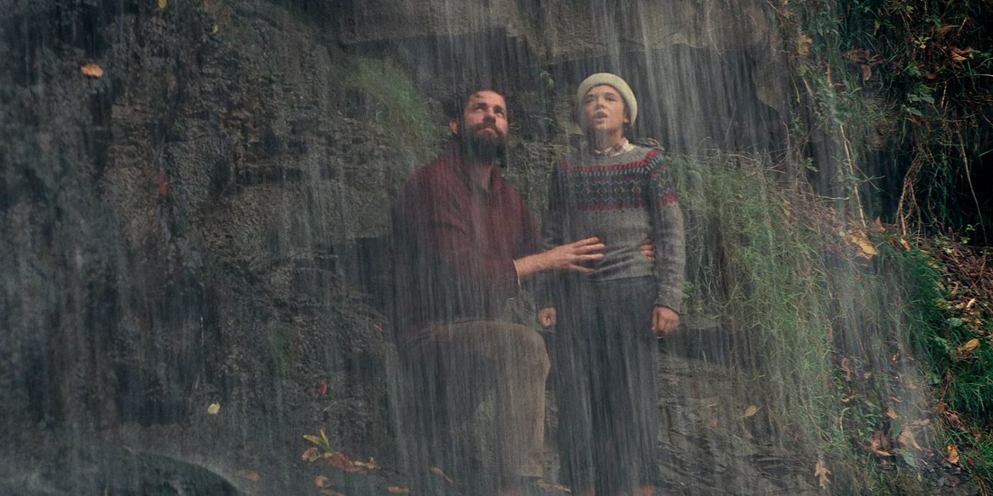 Lee and Marcus use a waterfall to mask their voices in A Quiet Place 