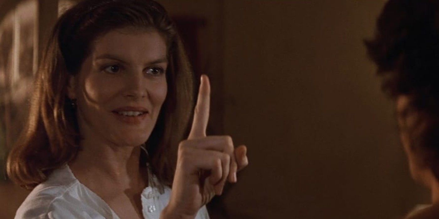 Rene Russo holding up a finger in Lethal Weapon 3