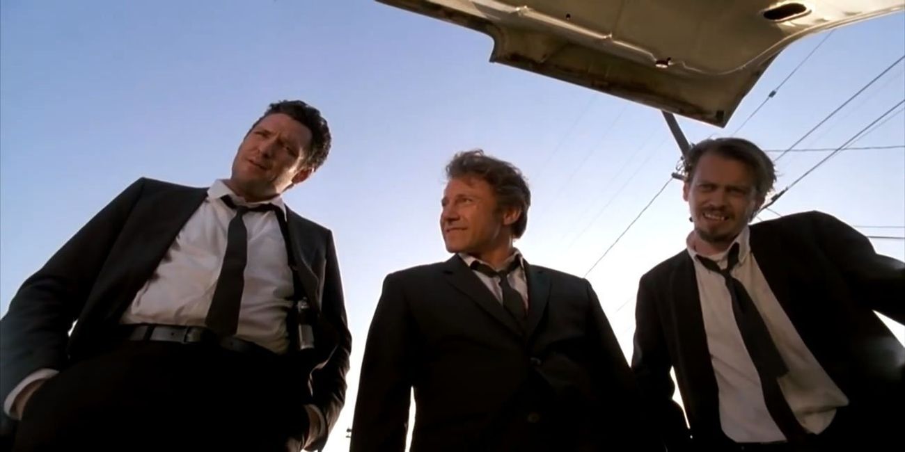 Mr. Blonde, Mr. White, and Mr. Pink look in the trunk of a car in Reservoir Dogs