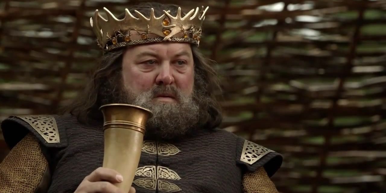 Robert Baratheon drinking during a tourney in Game of Thrones.