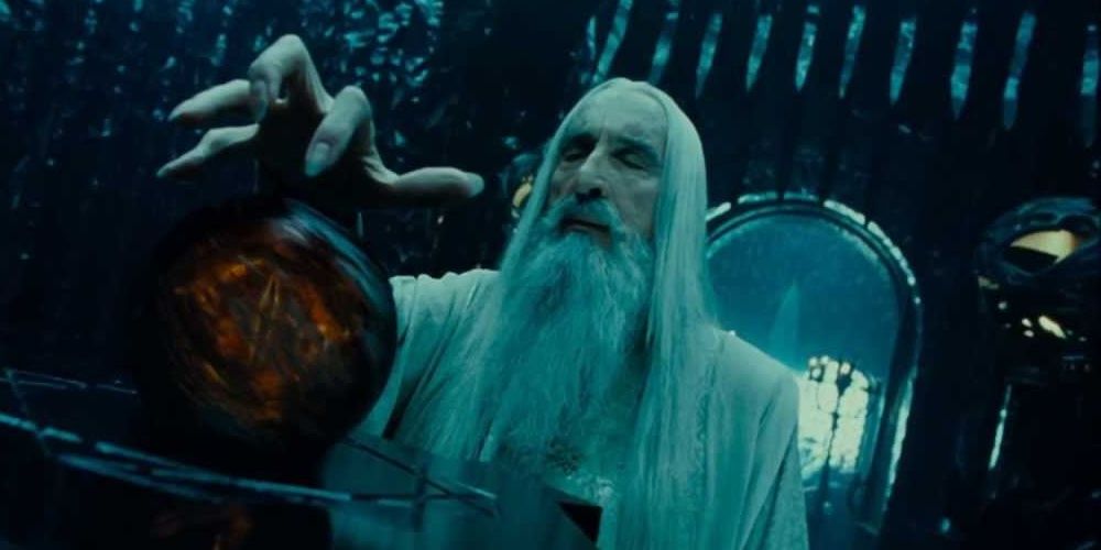 Saruman using the Palantir in the Lord of the Rings