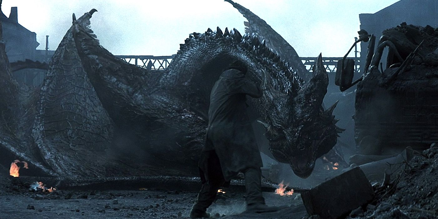 Human survivors battling a massive dragon in Reign of Fire