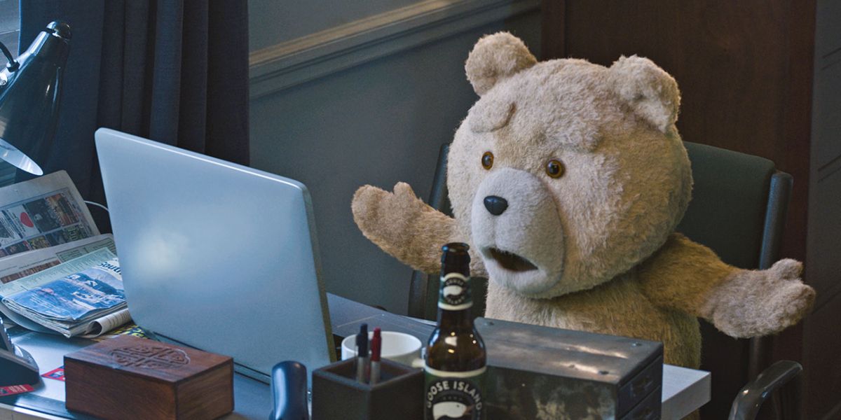 Ted looking at John's laptop in Ted 2