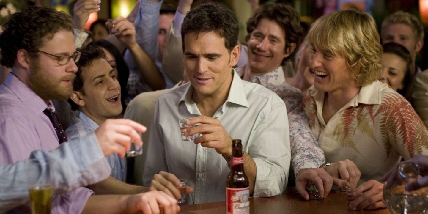 Seth Rogen, Matt Dillon and Owen Wilson drinking shots in a bar in You, Me and Dupree