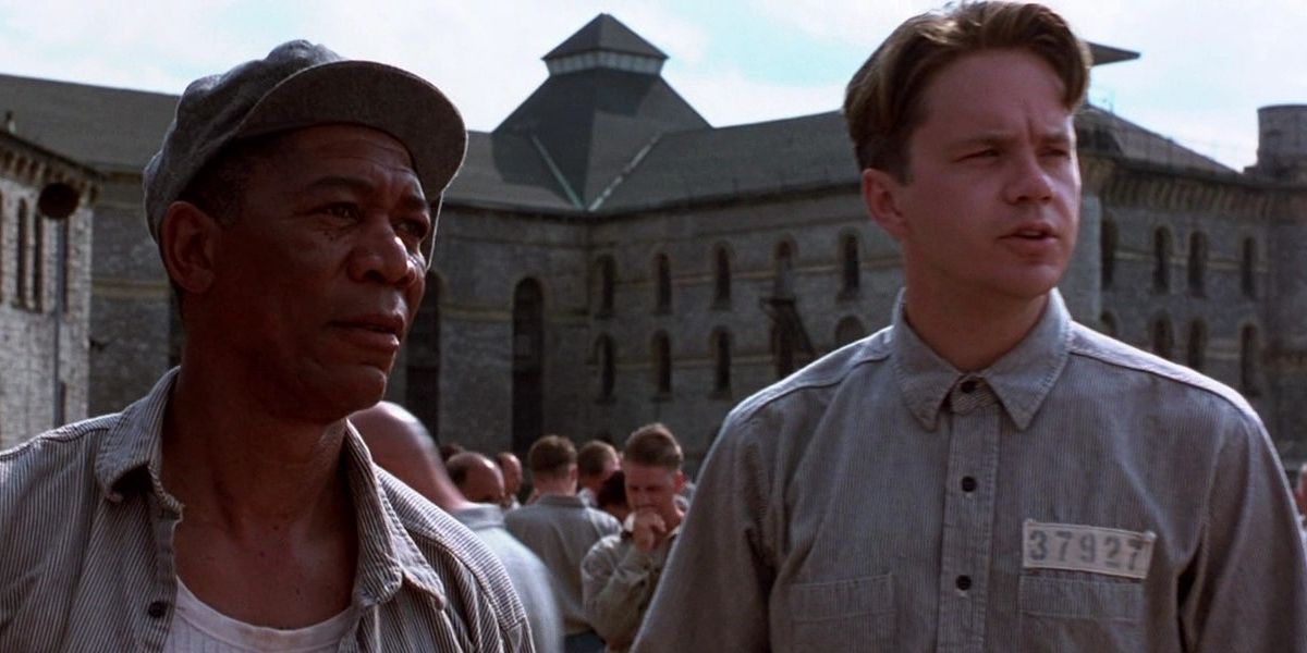 Andy and Red standing in the prison yard in The Shawshank Redemption