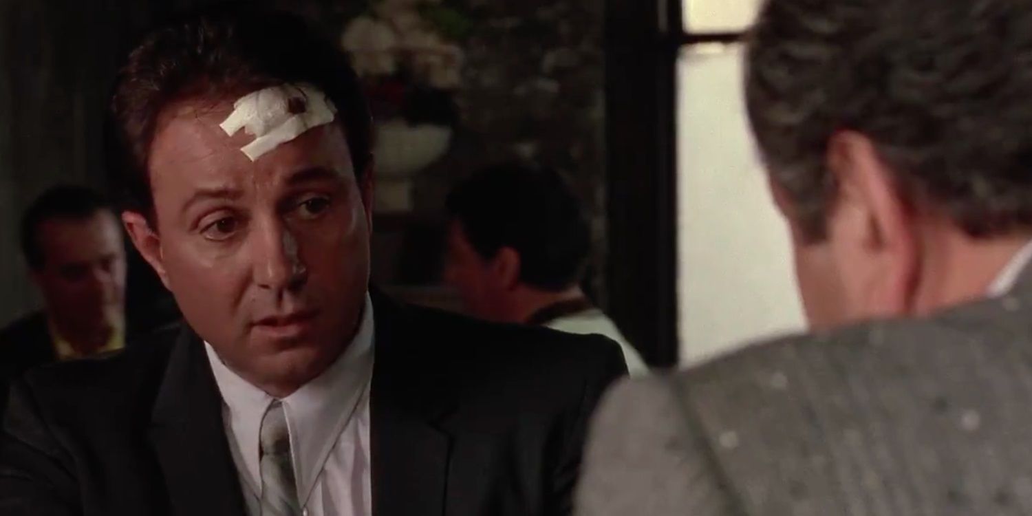 Sonny talks to Paulie in Goodfellas with a bandage on his head.