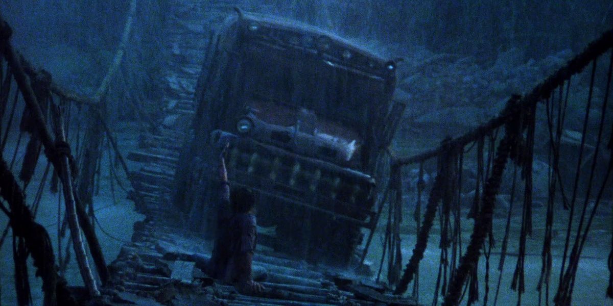 A truck drives across a rickety bridge in Sorcerer