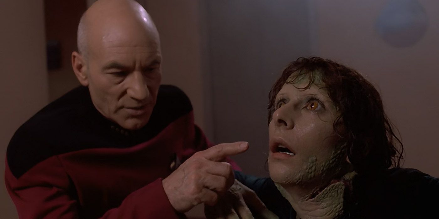 Picard examines a de-evolved Troi in Star Trek: The Next Generation