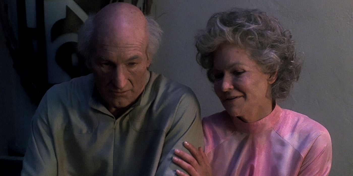 Older Picard with a woman in Star Trek The Next Generation.