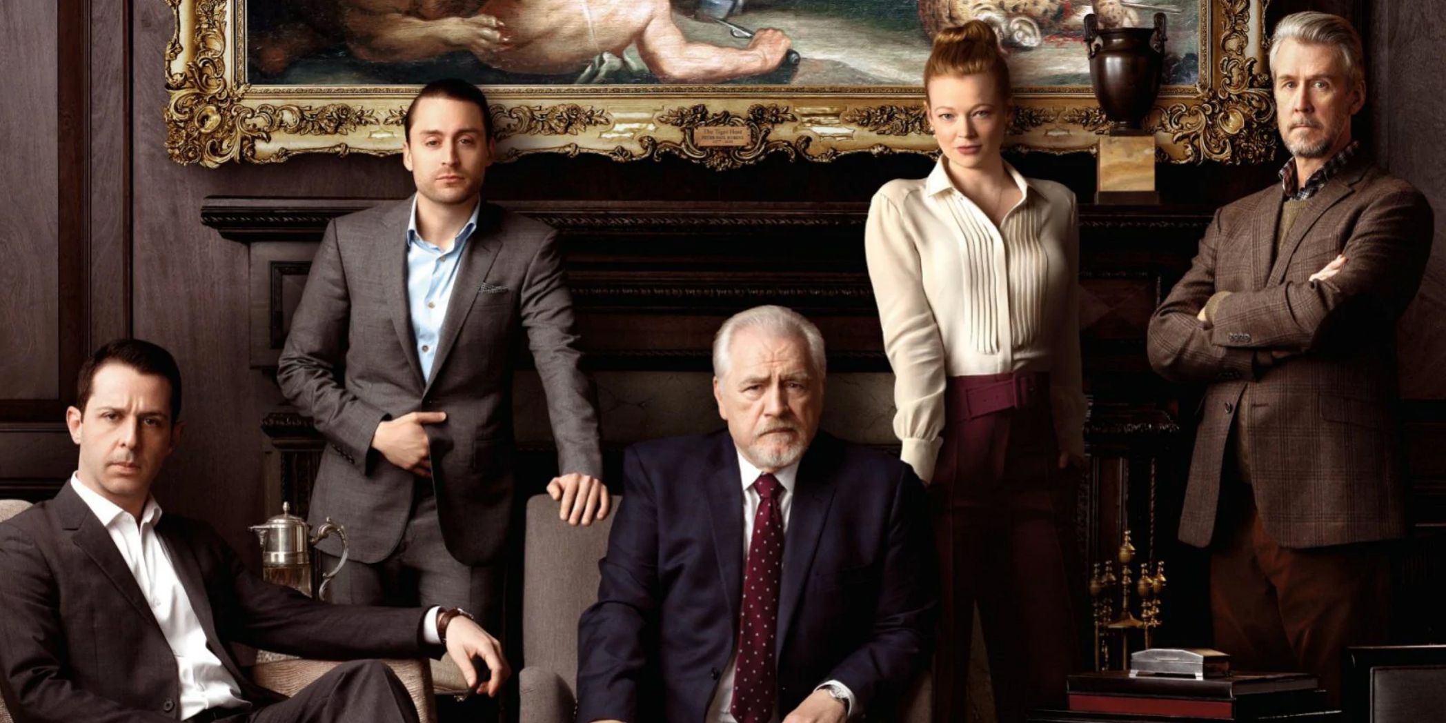 Cast of Succession standing together for a promotional photo shoot