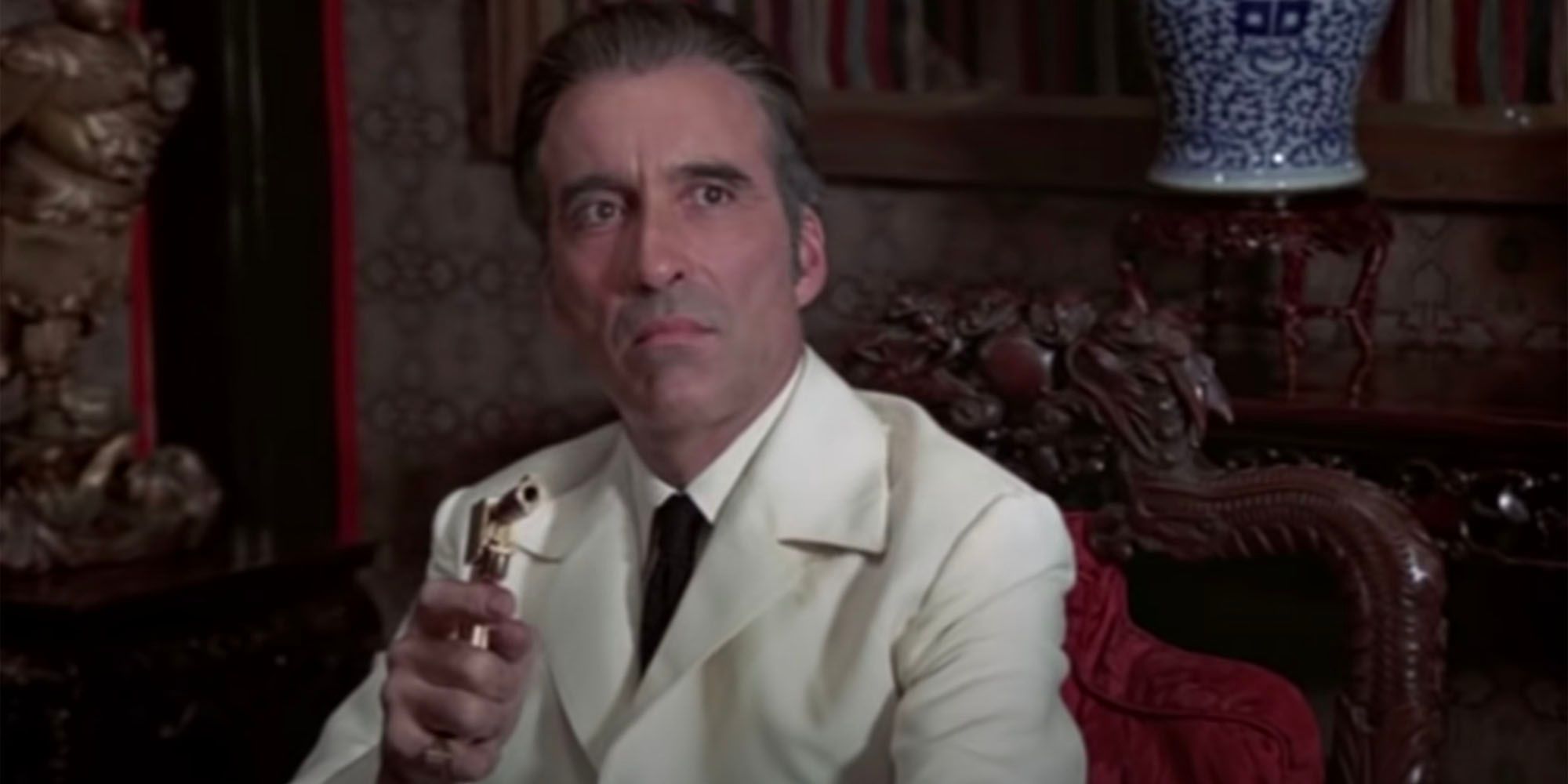 Christopher Lee as Scaramanga with the golden gun in The Man with the Golden Gun