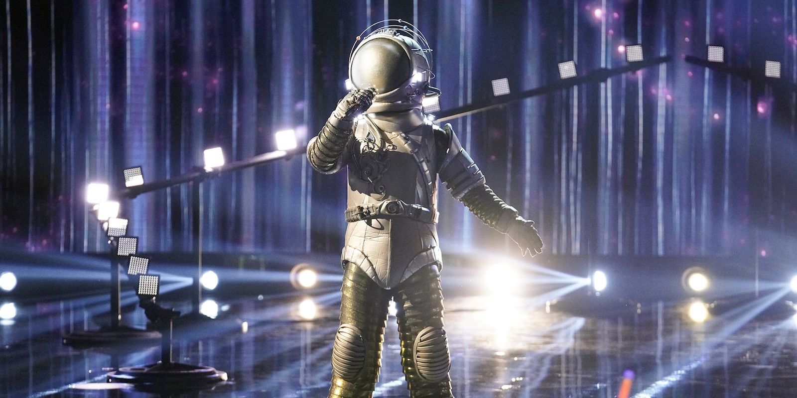 The Astronaut performing on The Masked Singer stage