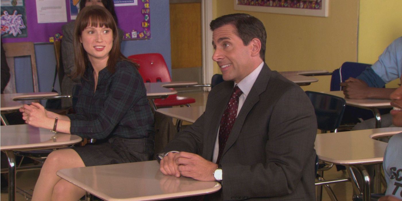 Erin and Michael sitting together in a school desk in The Office