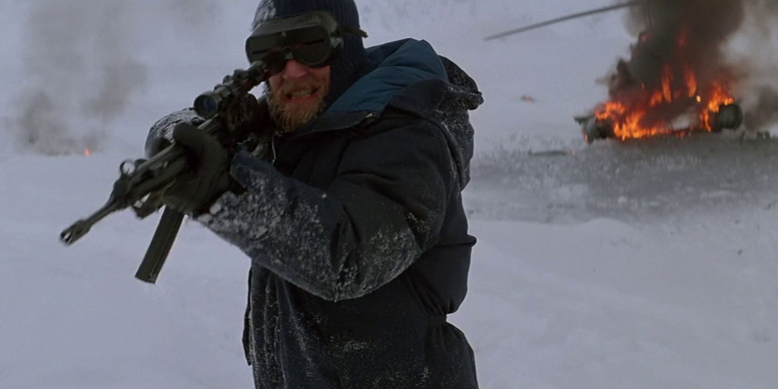 The Norwegian aims his rifle at the dog in The Thing
