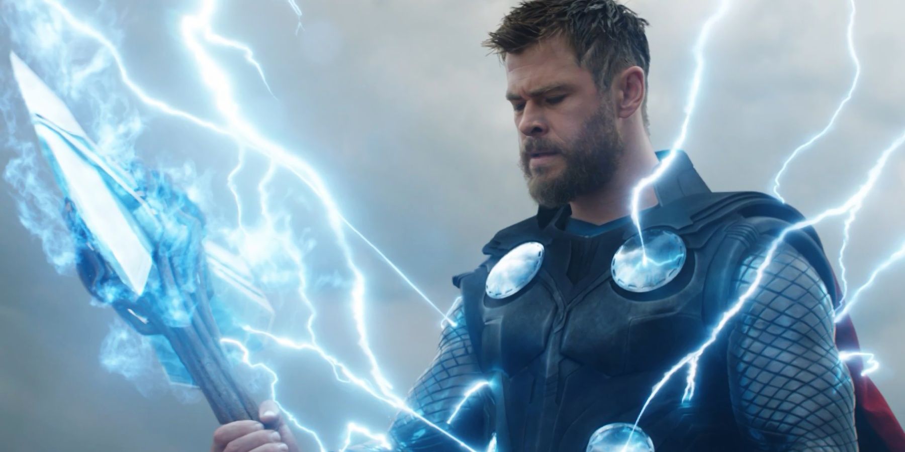 Thor wielding Stormbreaker while lightning comes out of him