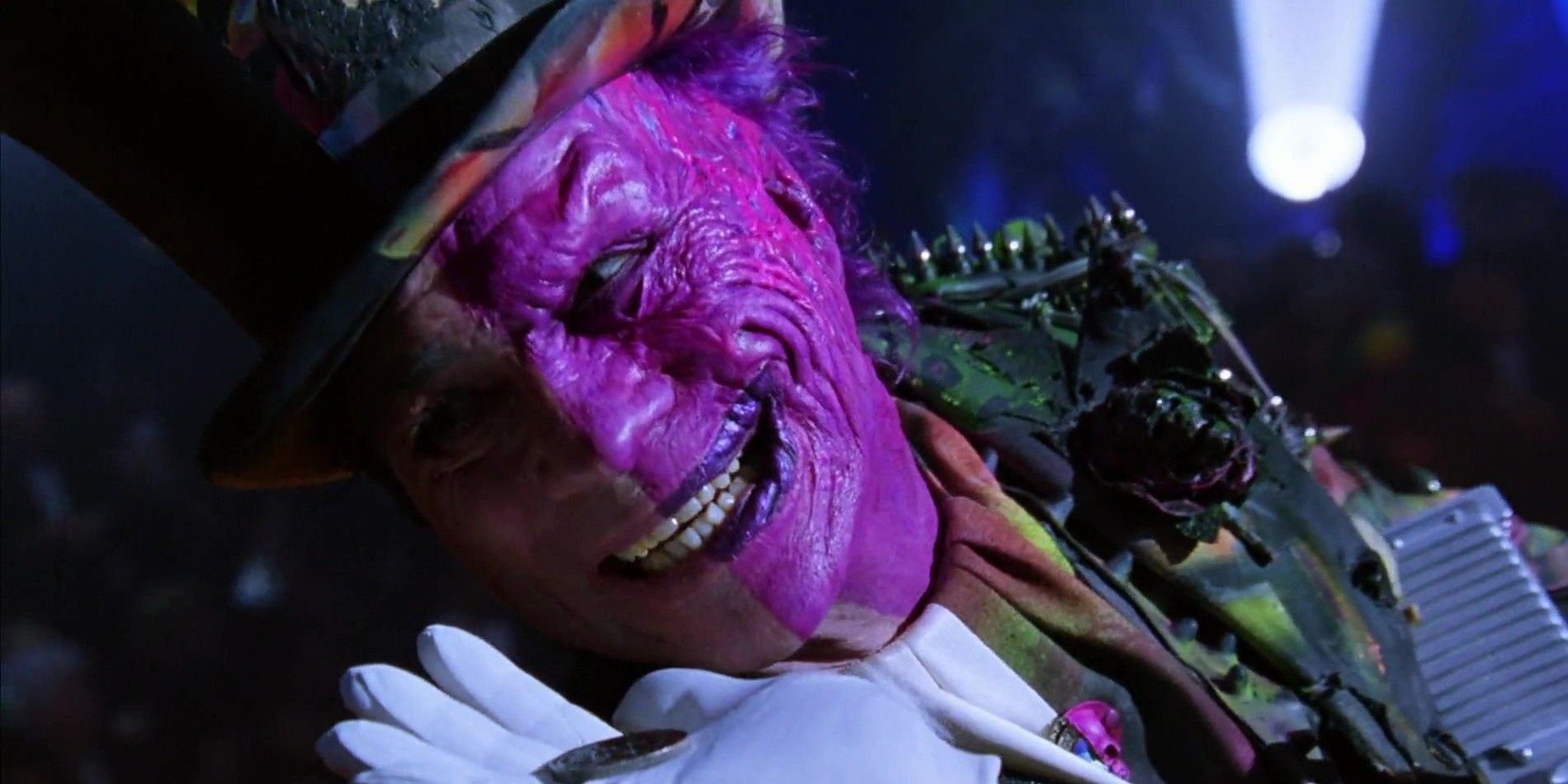 Tommy Lee Jones as Two-Face smiling in Batman Forever