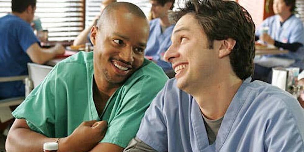 Turk and J.D. smile at each other