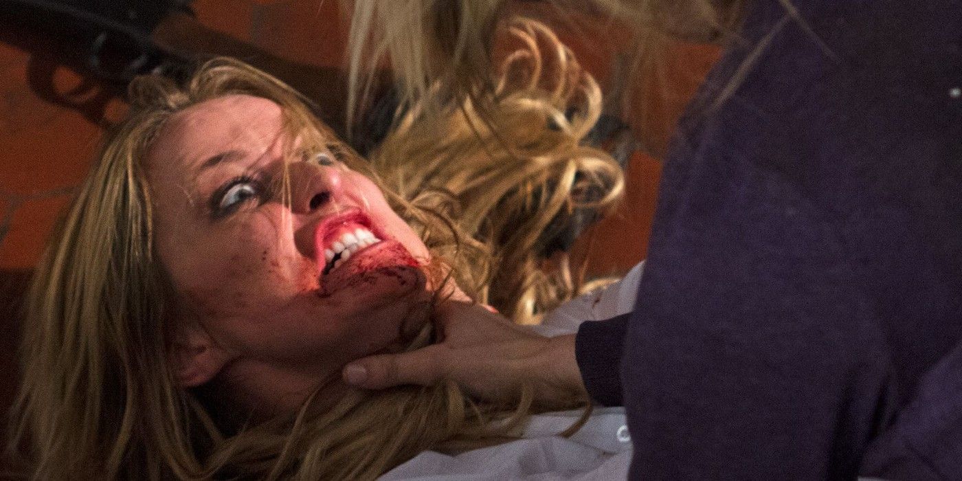 A woman is choked during a fight in Wrong Turn