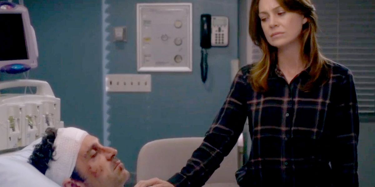 Derek lays in hospital bed, Meredith keeps her hand on his shoulder