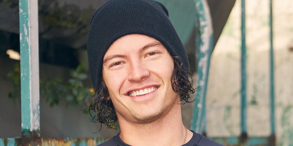 Jay Starrett's smiling in a promotional photo from The Challenge