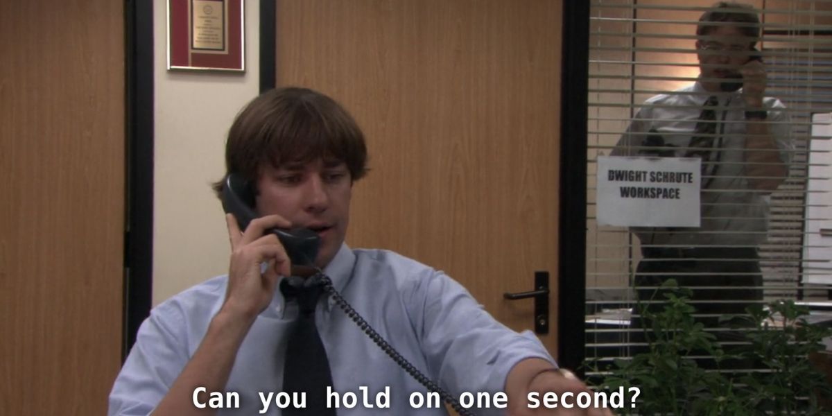 Dwight uses the meeting room as his workspace in The Office