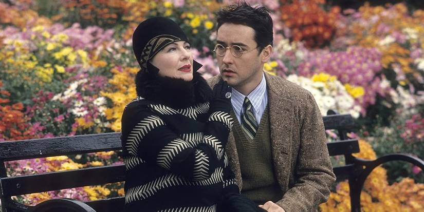 John Cusack and Diane Wiest on a park bench in Bullets Over Broadway