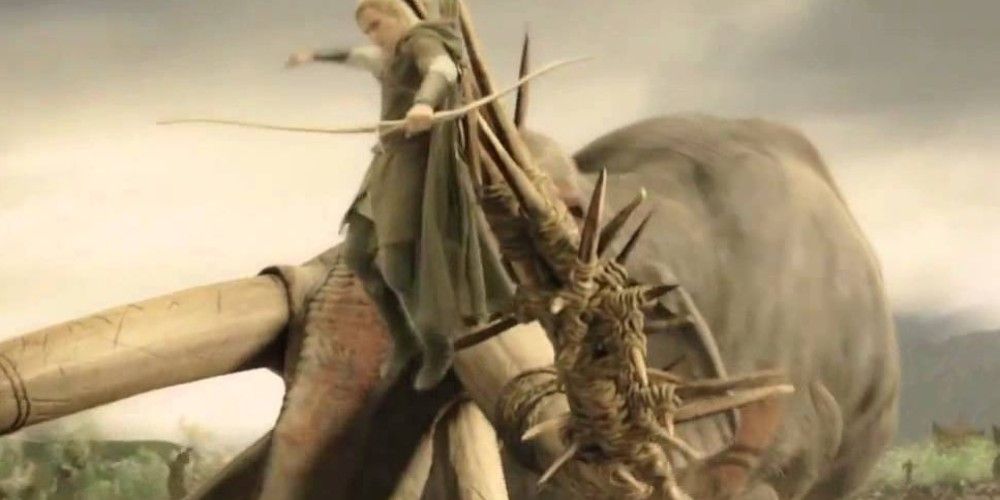 Legolas jumps down while shooting an arrow