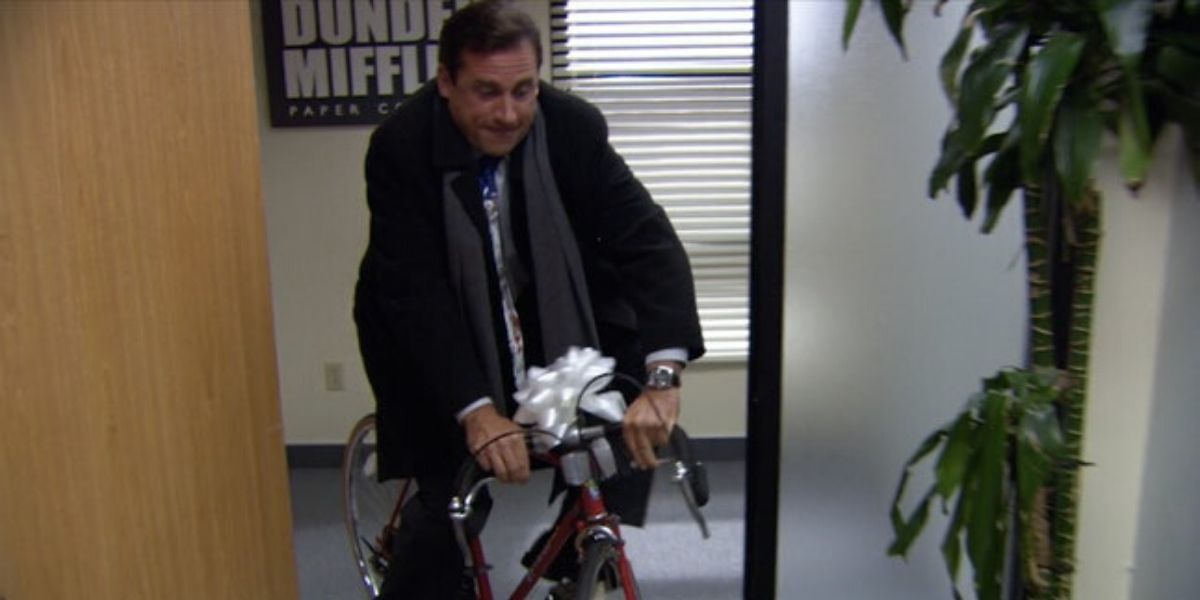 Michael rides a boke in the office in The Office.