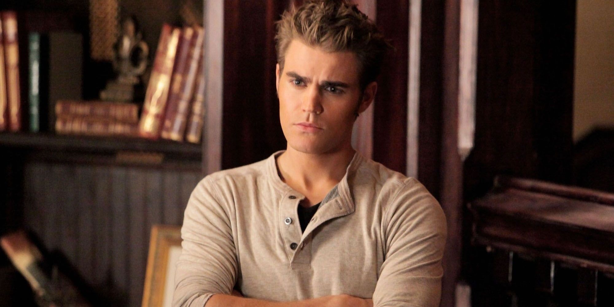 Stefan with his arms crossed in The Vampire Diaries.