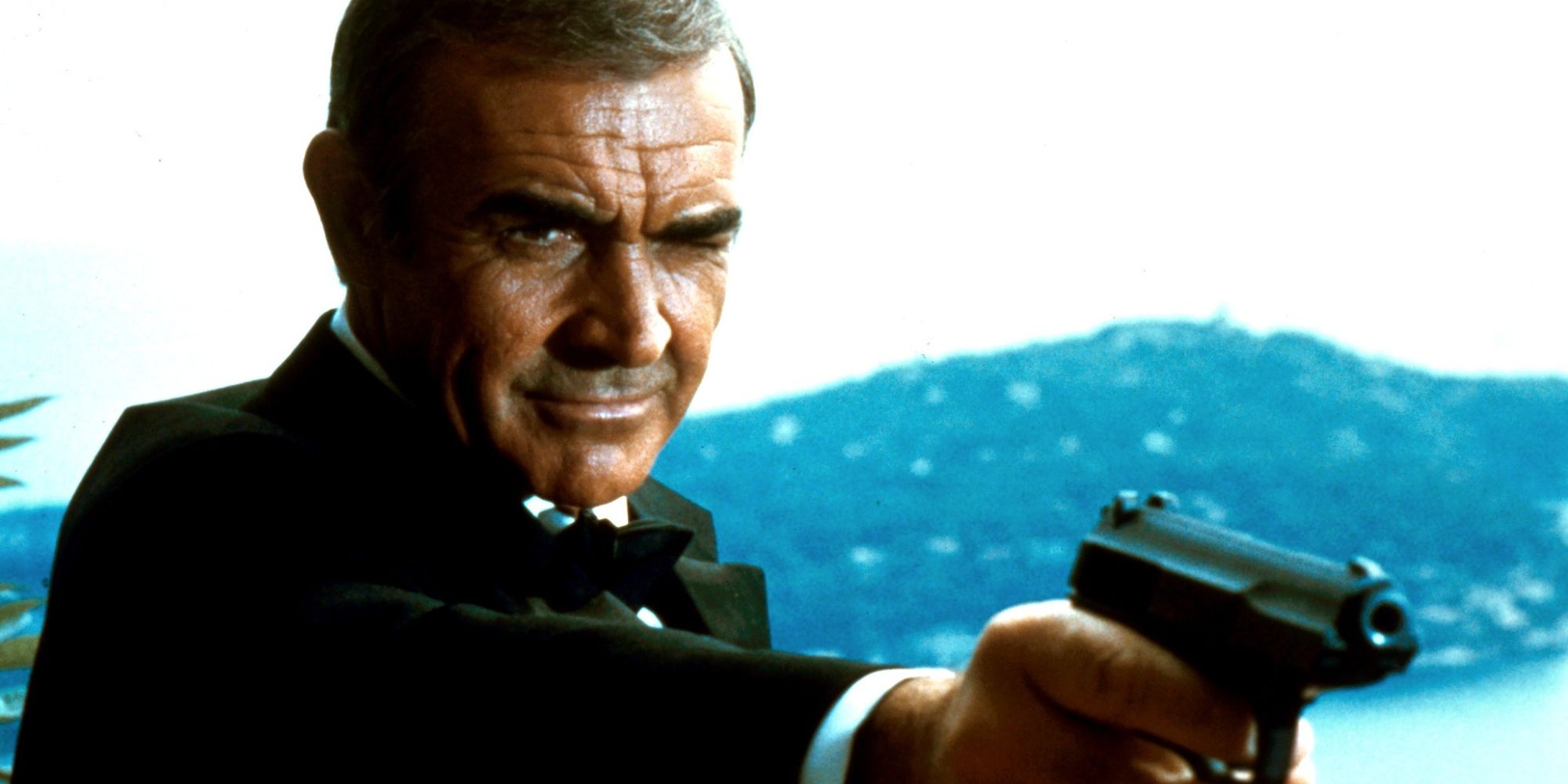Sean Connery pointing a gun as James Bond in Never Say Never Again