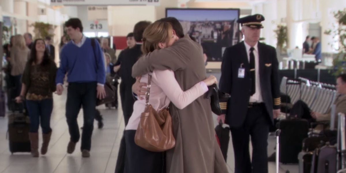 Michael and Pam hug at the airport in The Office