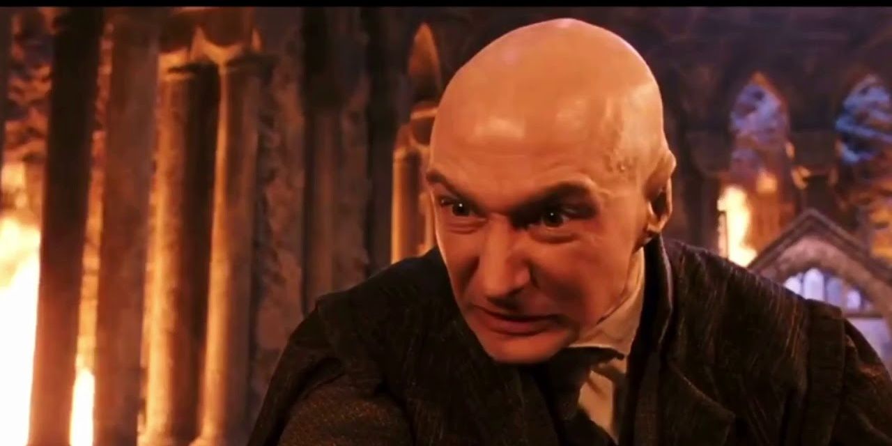 Quirrell attacks Harry in the Philosopher's Stone